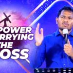 THE POWER IN CARRYING THE CROSS